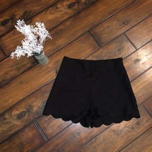 Black scallop shorts